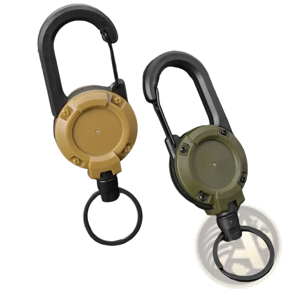 Two tactical-style retractable carabiner keychains in tan and olive green with heavy duty steel wire and matching rings
