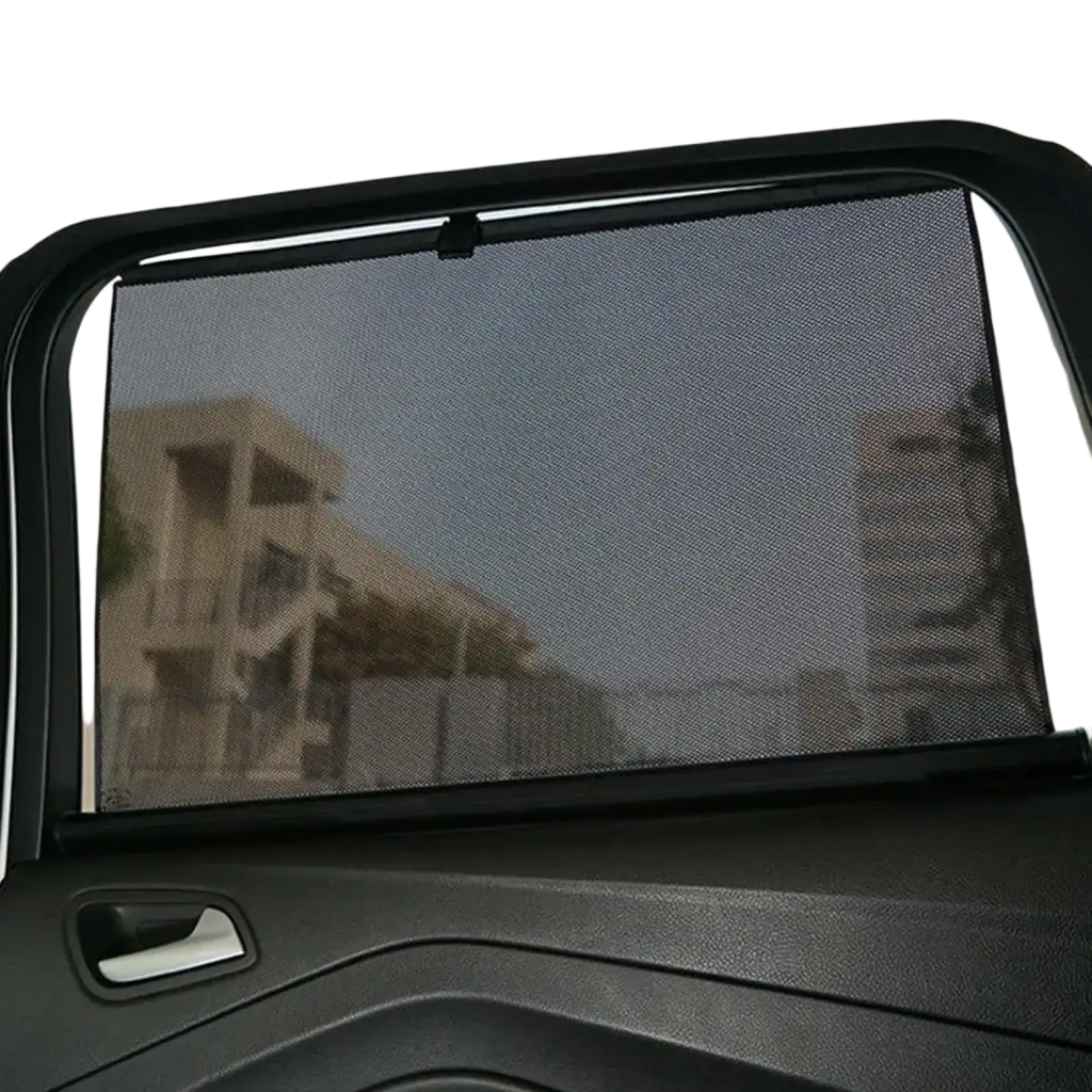 Black mesh retractable car window sunshade with sleek frameless design providing uv protection