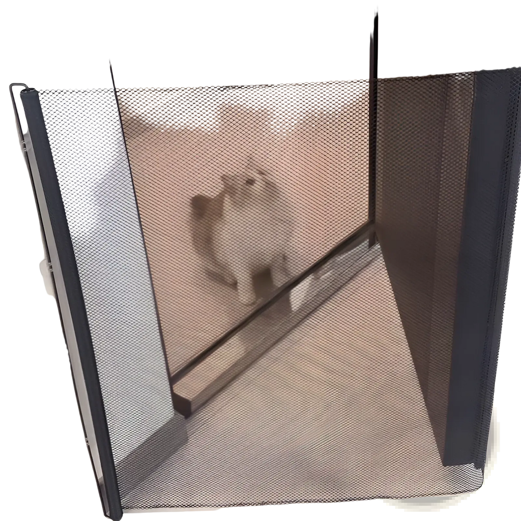 Retractable safety gate for pets and toddlers with black mesh and reinforced frame for secure door blocking