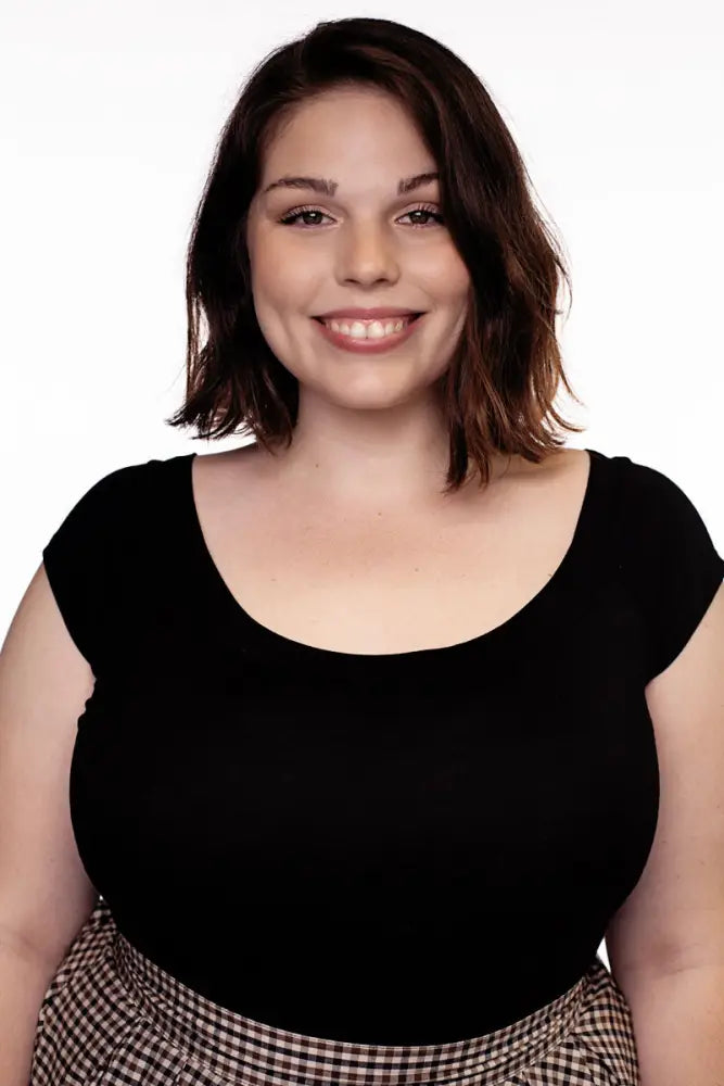 Black cap sleeve retro boat neck top in scoop neck design with short sleeves ideal for casual wear