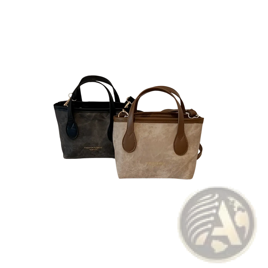 Beige and brown suede retro bucket bag with textured canvas and matching leather handles for shoulder wear