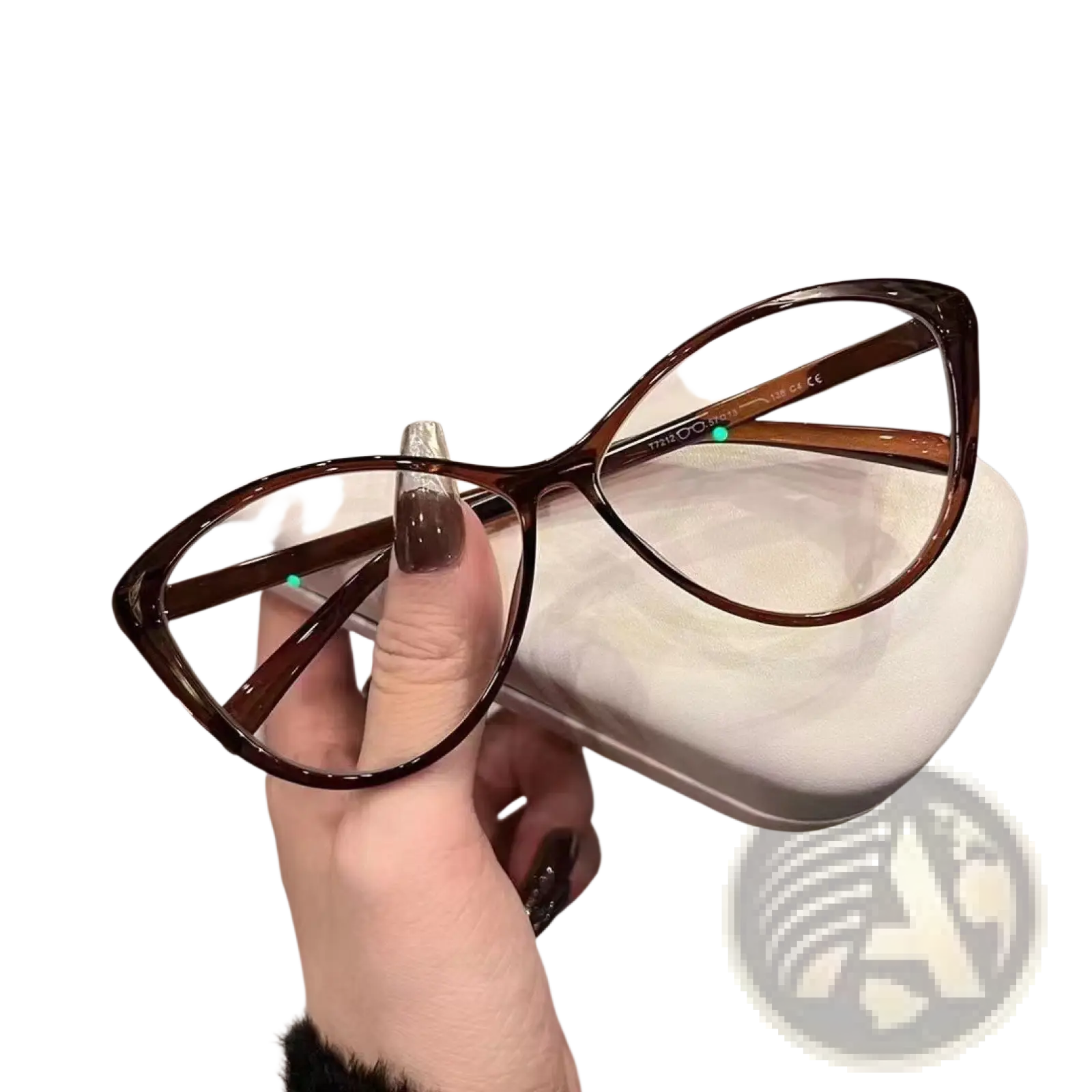 A pair of brown cat eye uv380 lightweight fashion sunglasses with a glossy translucent frame