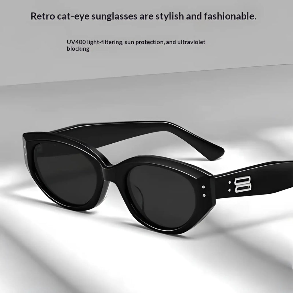Black cat eye uv400 sunglasses with sleek glossy frames and dark lenses for retro modern style protection