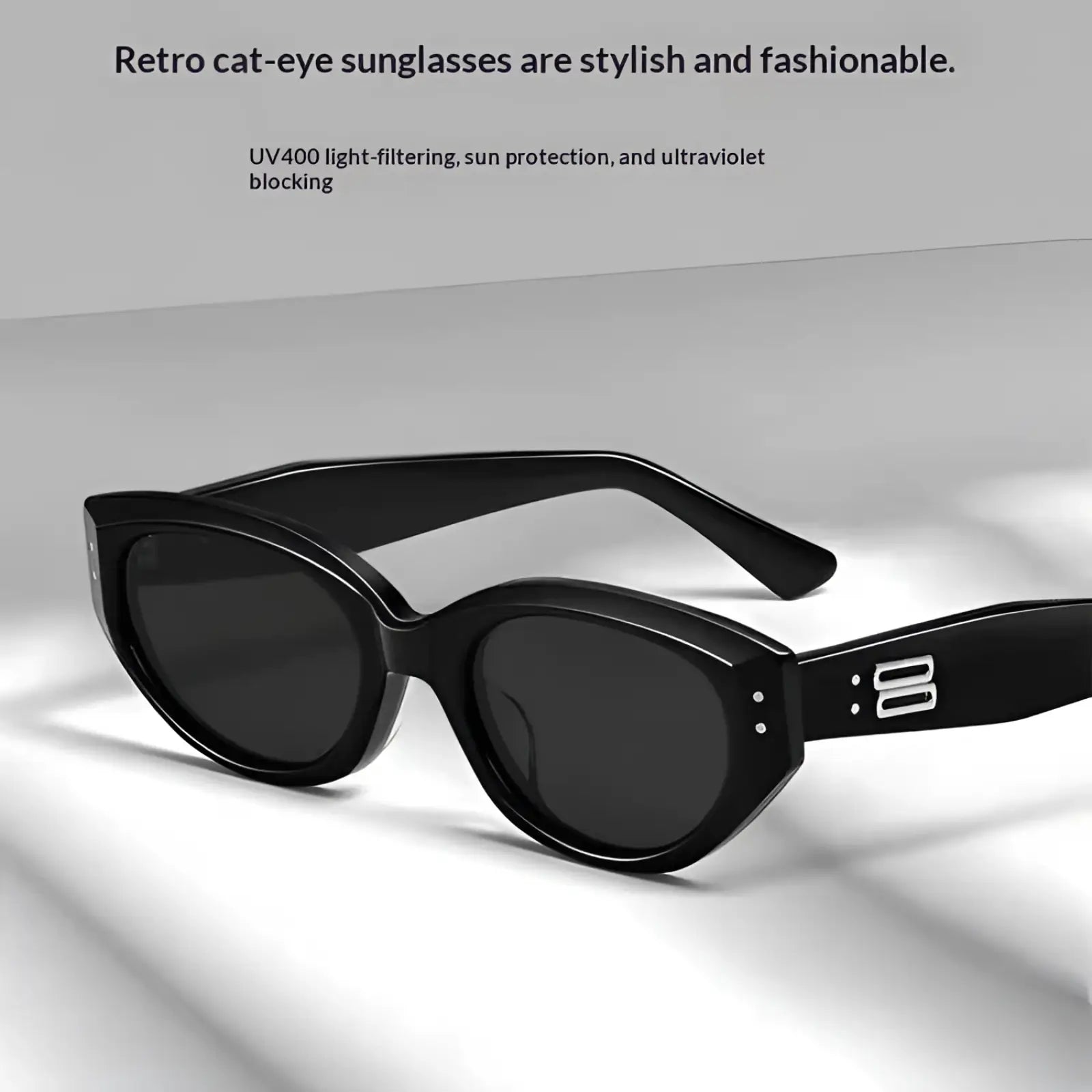 Black cat eye uv400 sunglasses with sleek glossy frames and dark lenses for retro modern style protection