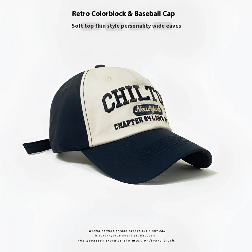 Retro colorblock baseball cap sun hat with cream front panel navy sides and black chilton embroidered lettering over patch