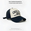 Retro colorblock baseball cap sun hat with cream front panel navy sides and black chilton embroidered lettering over patch