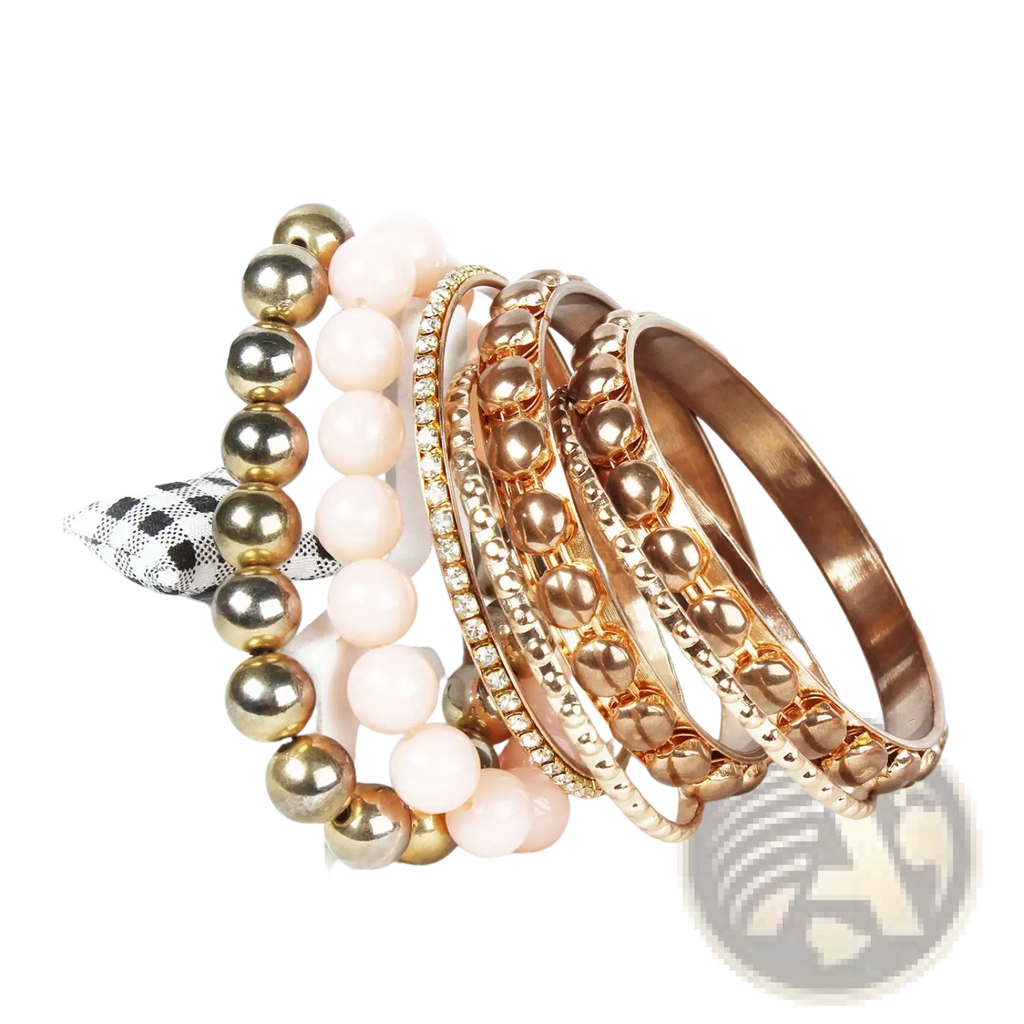 A set of five elegant retro gold and pink rhinestone bangle bracelets in rose gold and silver tones with beaded textures