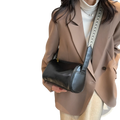 Black leather retro crossbody bag with a patterned strap designed for stylish everyday use