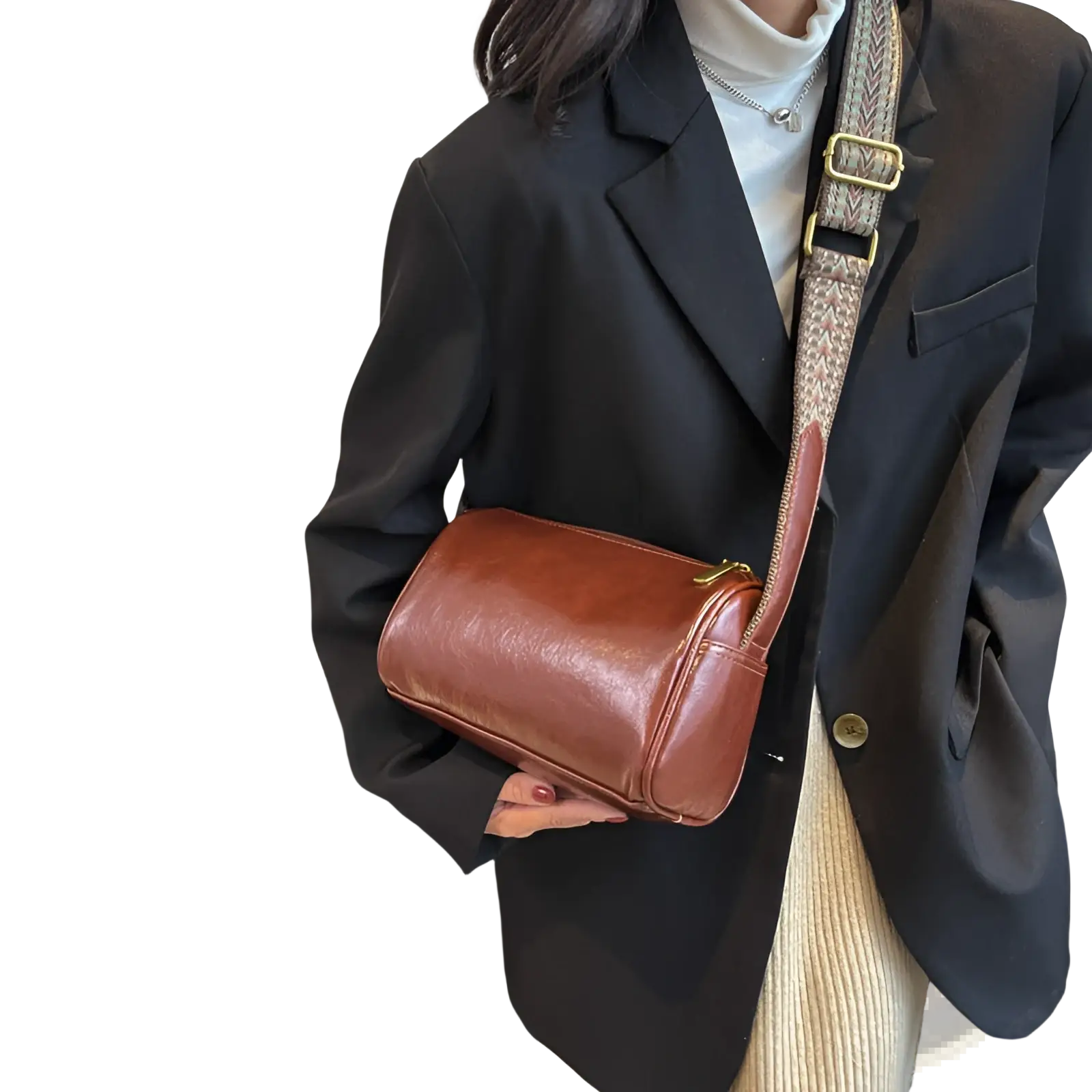 Retro leather crossbody bag in brown with patterned strap and gold-tone hardware for stylish everyday use