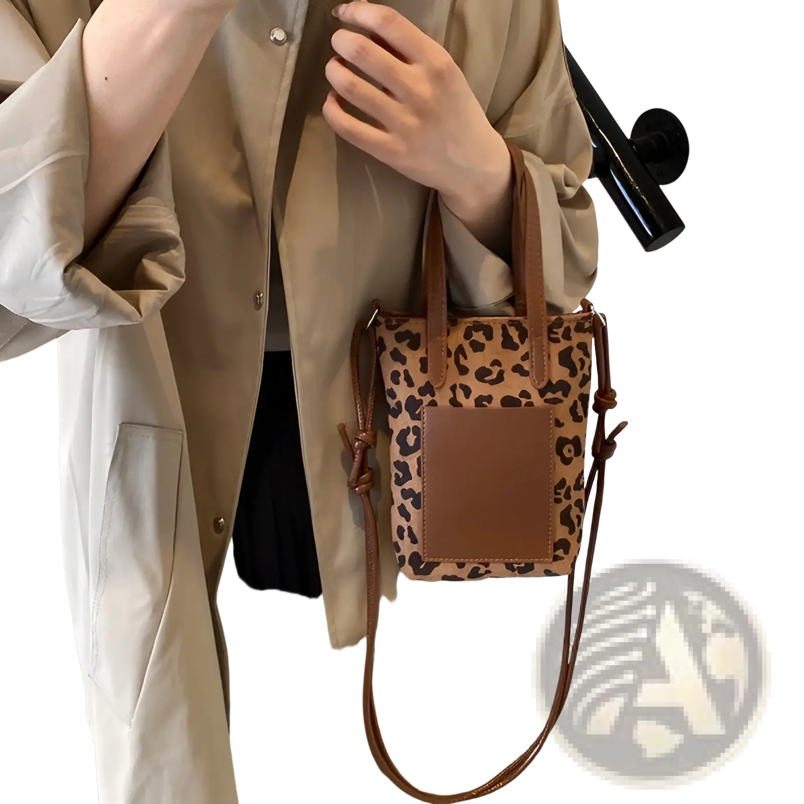 Retro leopard print suede mini bucket crossbody bag with brown leather handles and matching adjustable strap