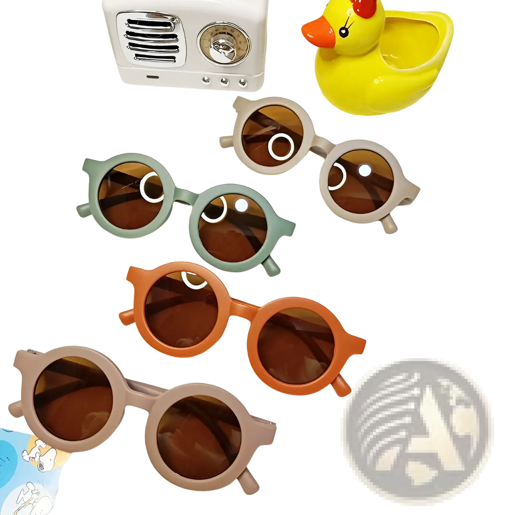Set of four colorful children’s retro round dog sunglasses with pastel green beige and orange frames and brown lenses