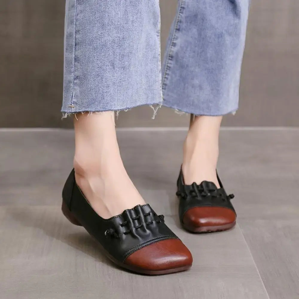 Retro soft sole leather tassel loafers in black and brown leather with decorative lace-up detail on the toe