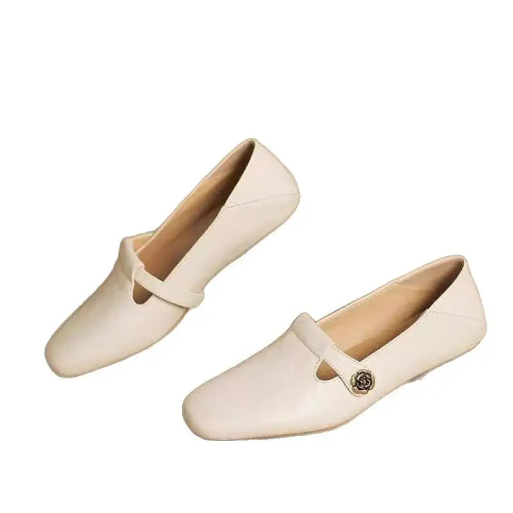 Cream-colored leather retro square toe loafers featuring a rose-shaped metal buckle detail on the strap