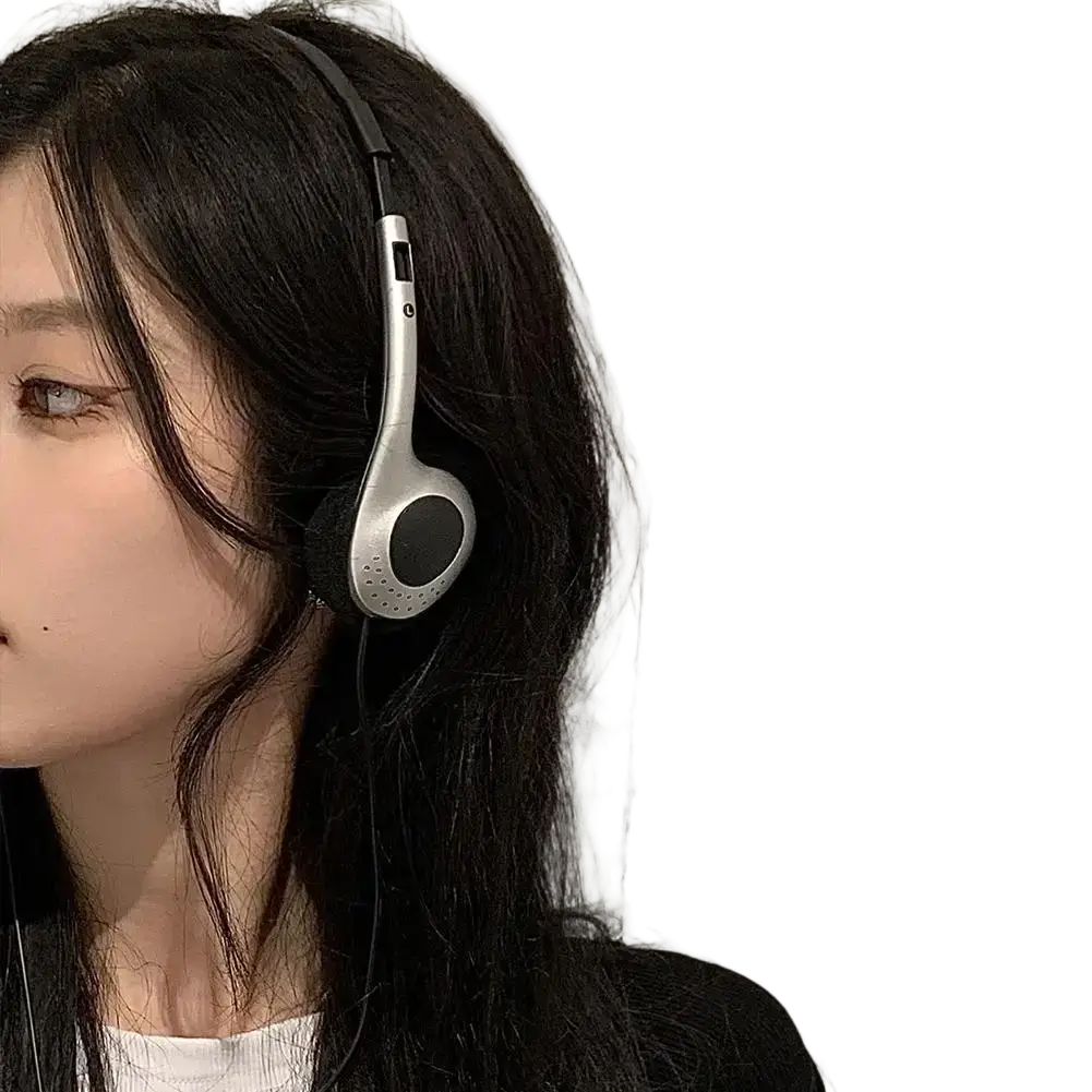 Silver retro wired over-ear headphones with black earcups and sleek minimalist design for comfortable listening