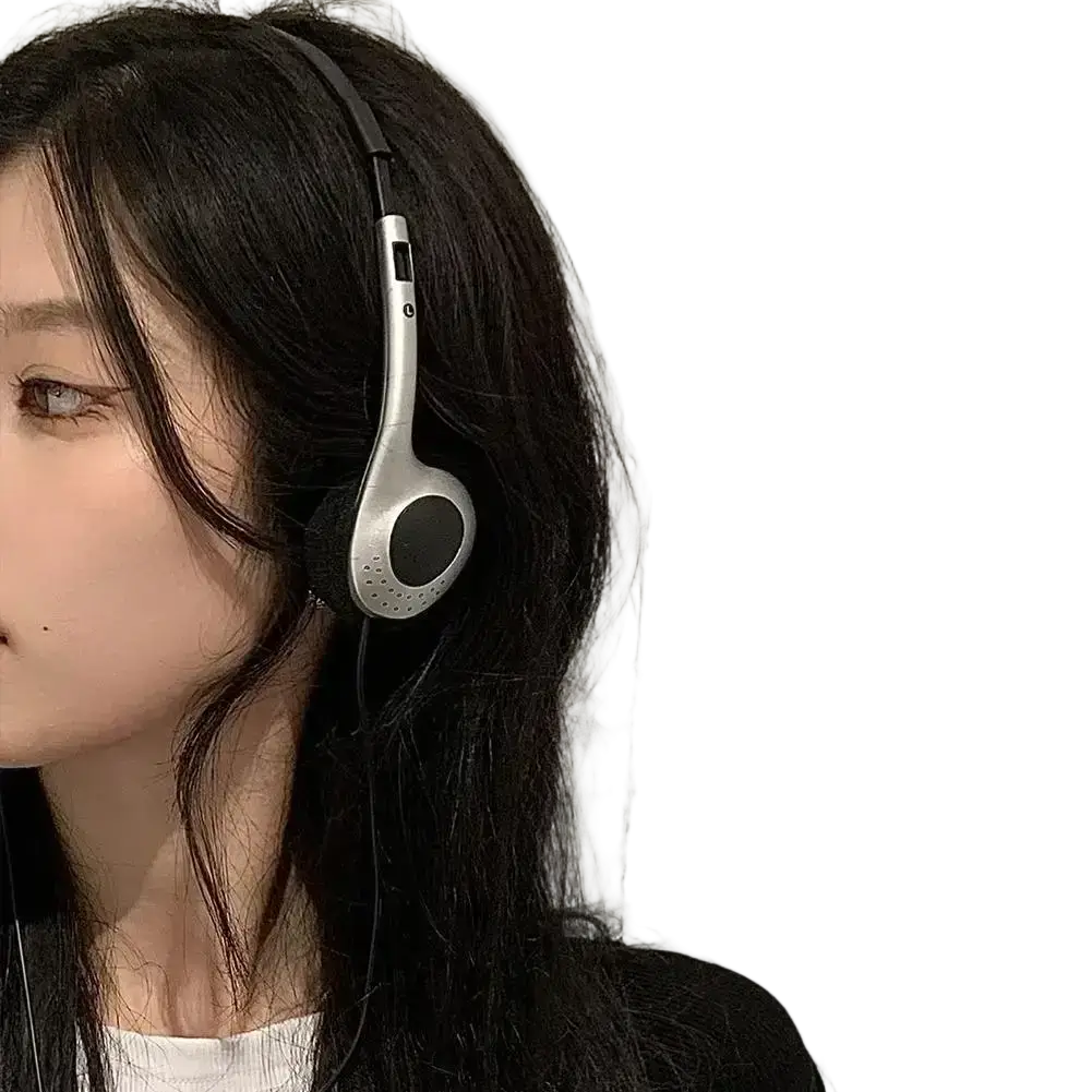 Silver wired over-ear headphones with sleek minimalist design and black ear cushions for comfortable listening