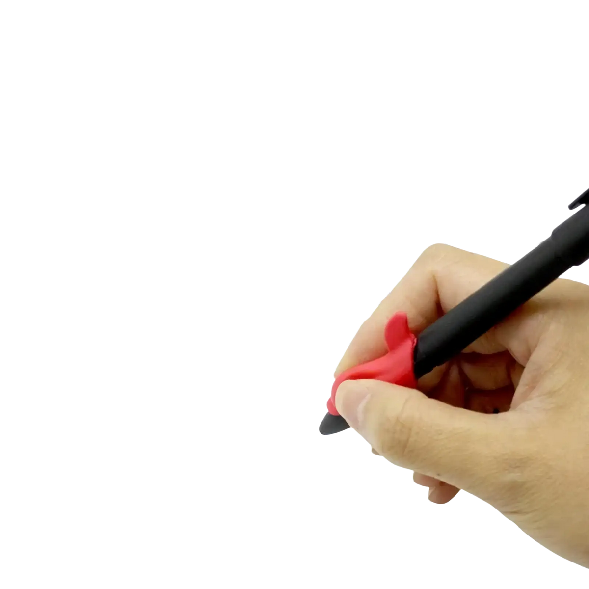 A hand holds a black pen with red grip writing letter g on a reusable magic practice copybook for kids calligraphy