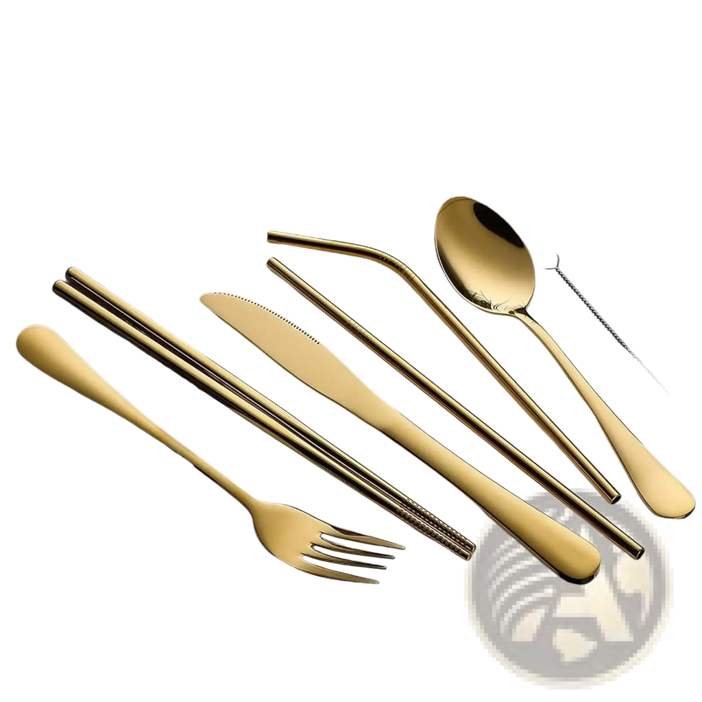 Gold-colored stainless steel reusable travel cutlery set with spoon fork knife and chopsticks arranged on white plate