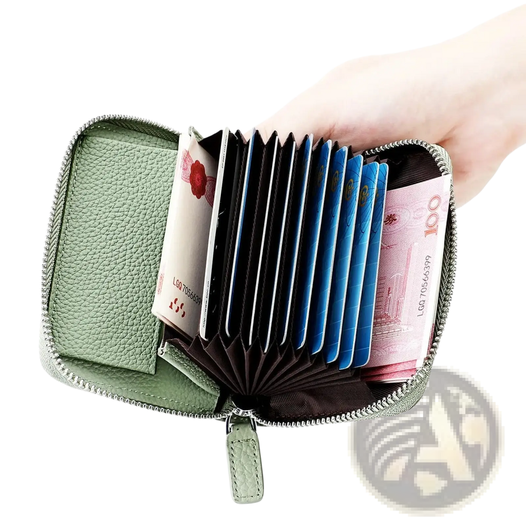 A light green textured leather RFID card wallet with silver zipper open to show card slots and compartments
