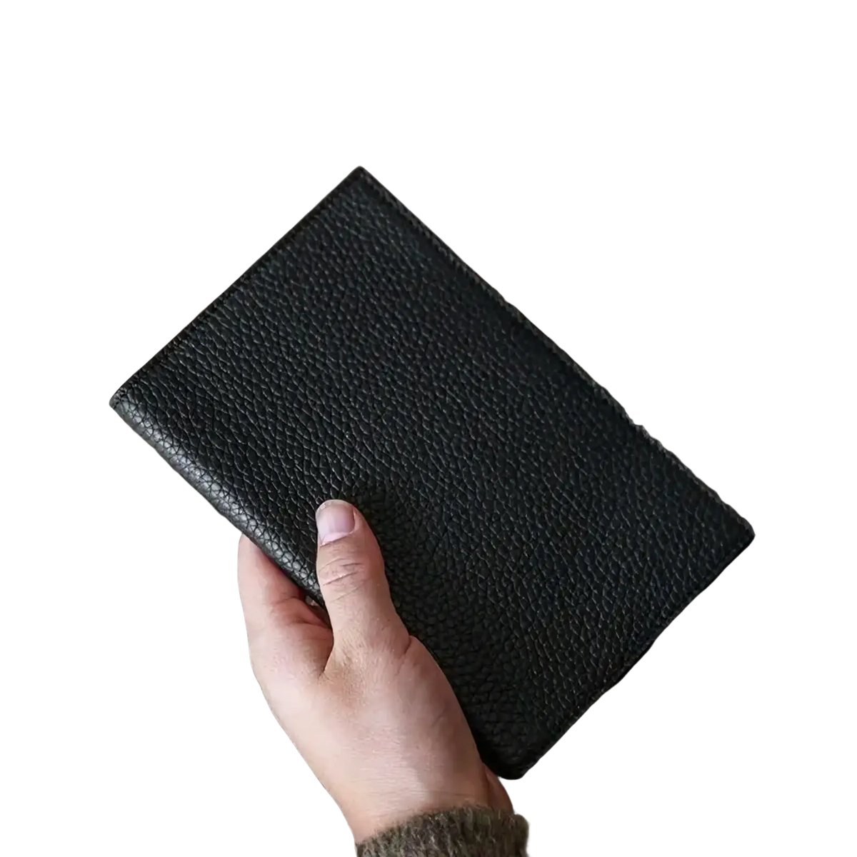 Black pebbled leather rfid passport holder travel wallet held in hand showing front side
