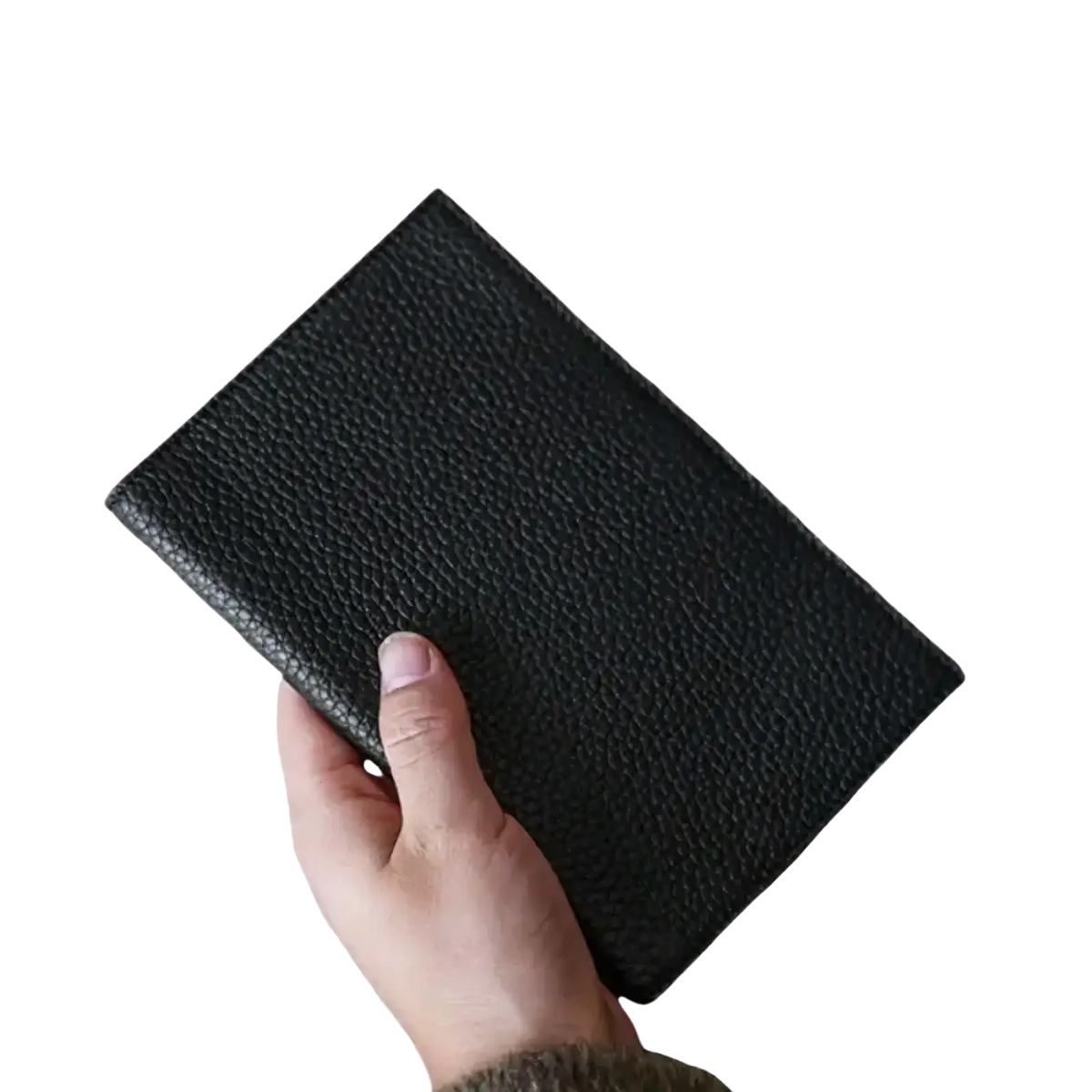 Black pebbled leather RFID passport holder travel wallet held in hand showcasing its textured surface
