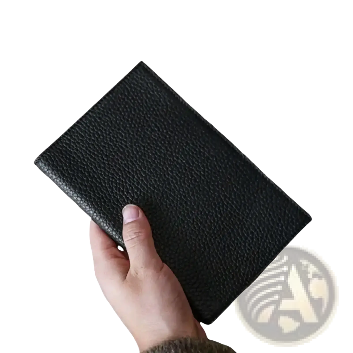 Black pebbled leather RFID passport holder travel wallet held in hand showcasing its textured surface