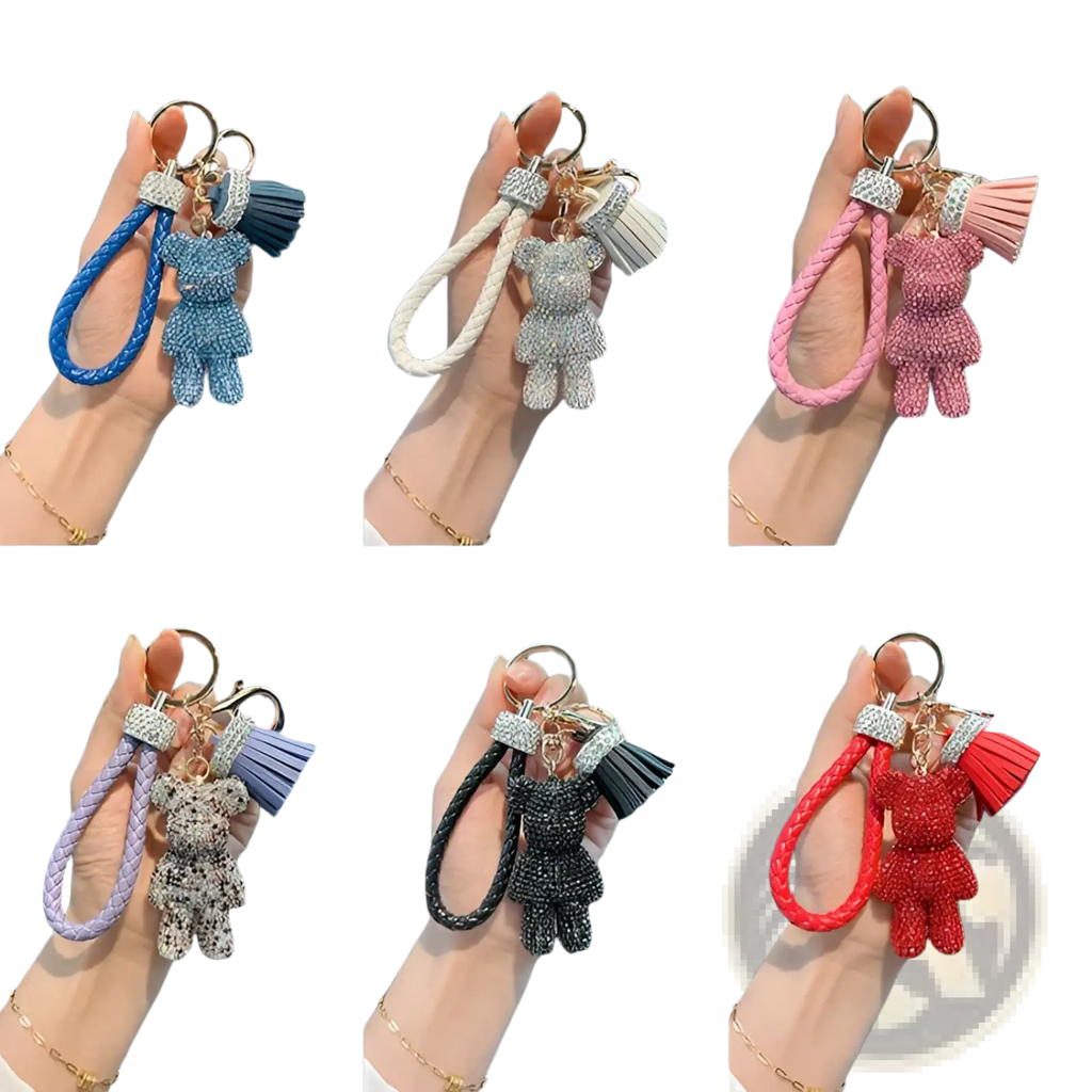 Rhinestone bear keychains in various colors with braided leather straps and matching tassels displayed together