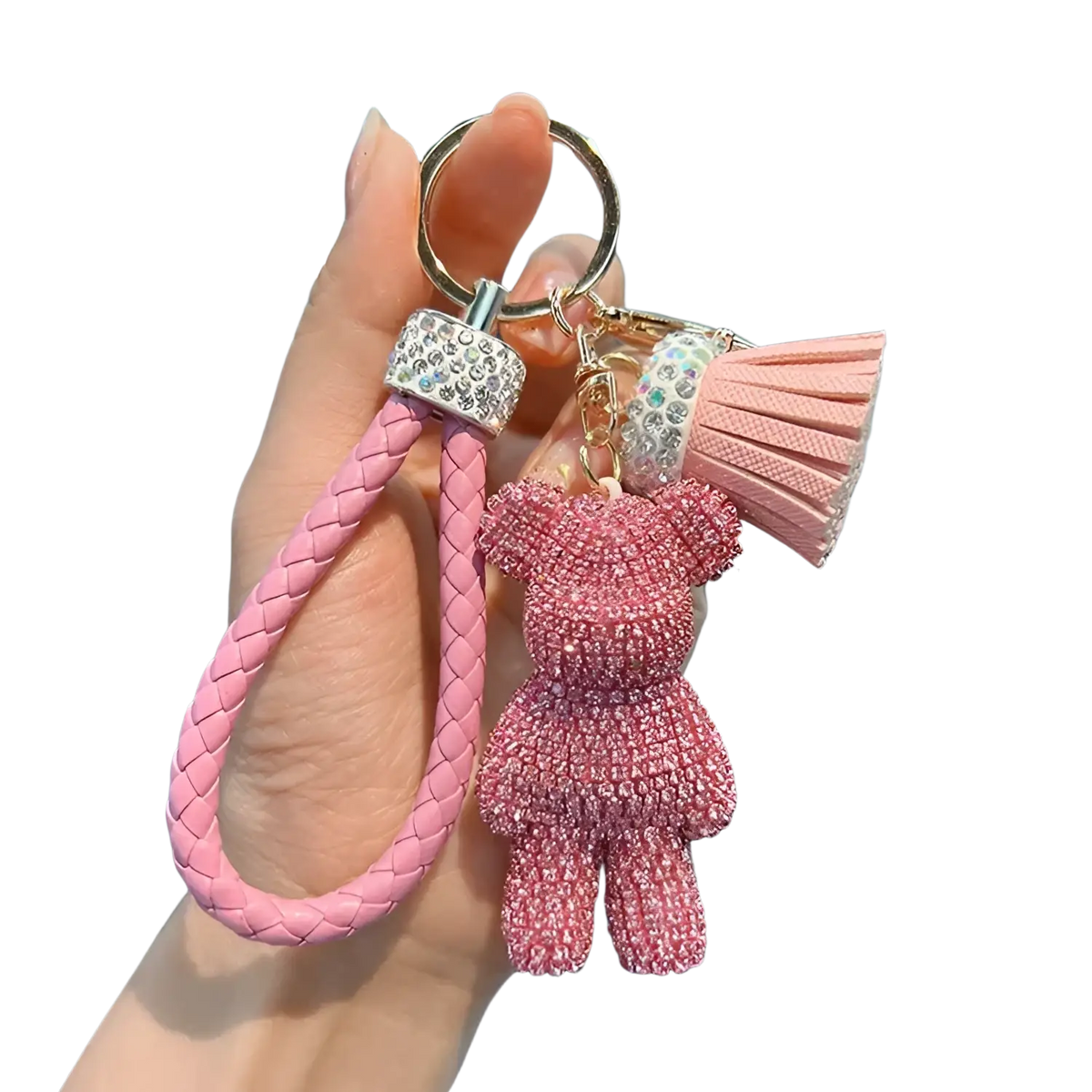 Pink braided leather keychain with rhinestone bear charm and matching pink tassel for stylish accessory use