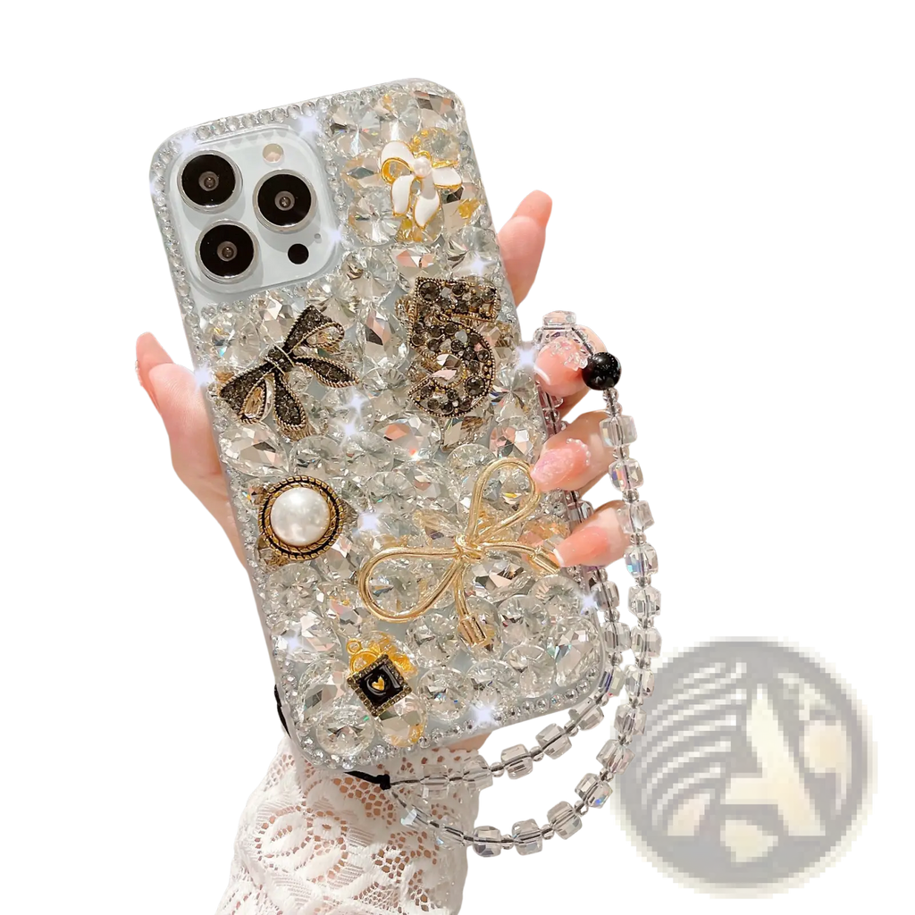 Back side of a sparkling clear rhinestone bow luxury iphone case decorated with gold and black bows pearls and rhinestones