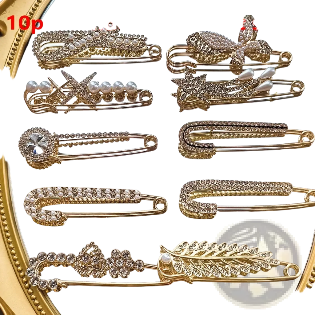 Gold-toned rhinestone brooch pin set with safety pin hair clips adorned with pearls bows stars flowers and feathers