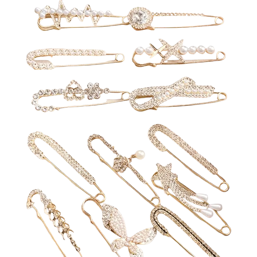 A set of gold-toned rhinestone brooch pins for women featuring crystals pearls and floral and bow designs for scarves