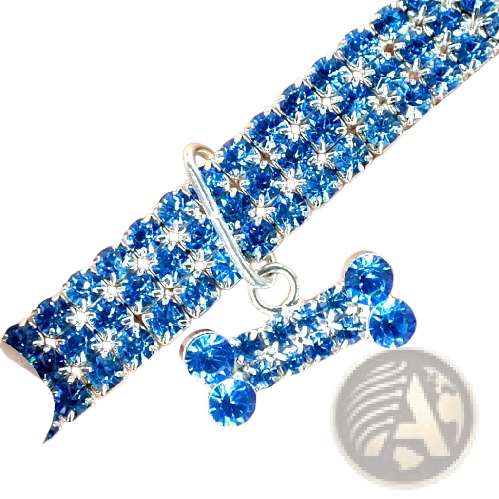 A sparkling blue rhinestone dog collar with a matching crystal bone charm for stylish pet accessories
