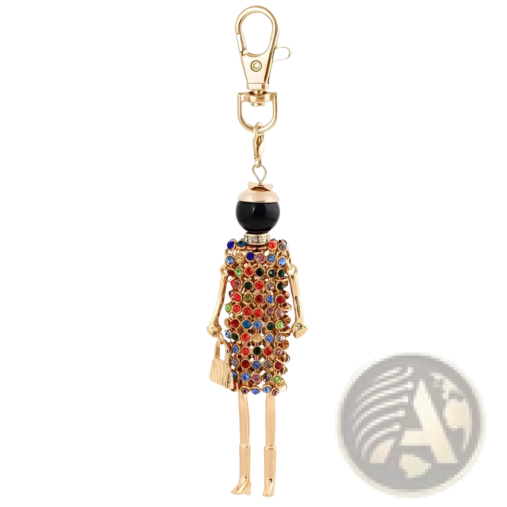 A gold-toned rhinestone doll keychain with a black bead head and colorful gemstone dress for women bag pendant