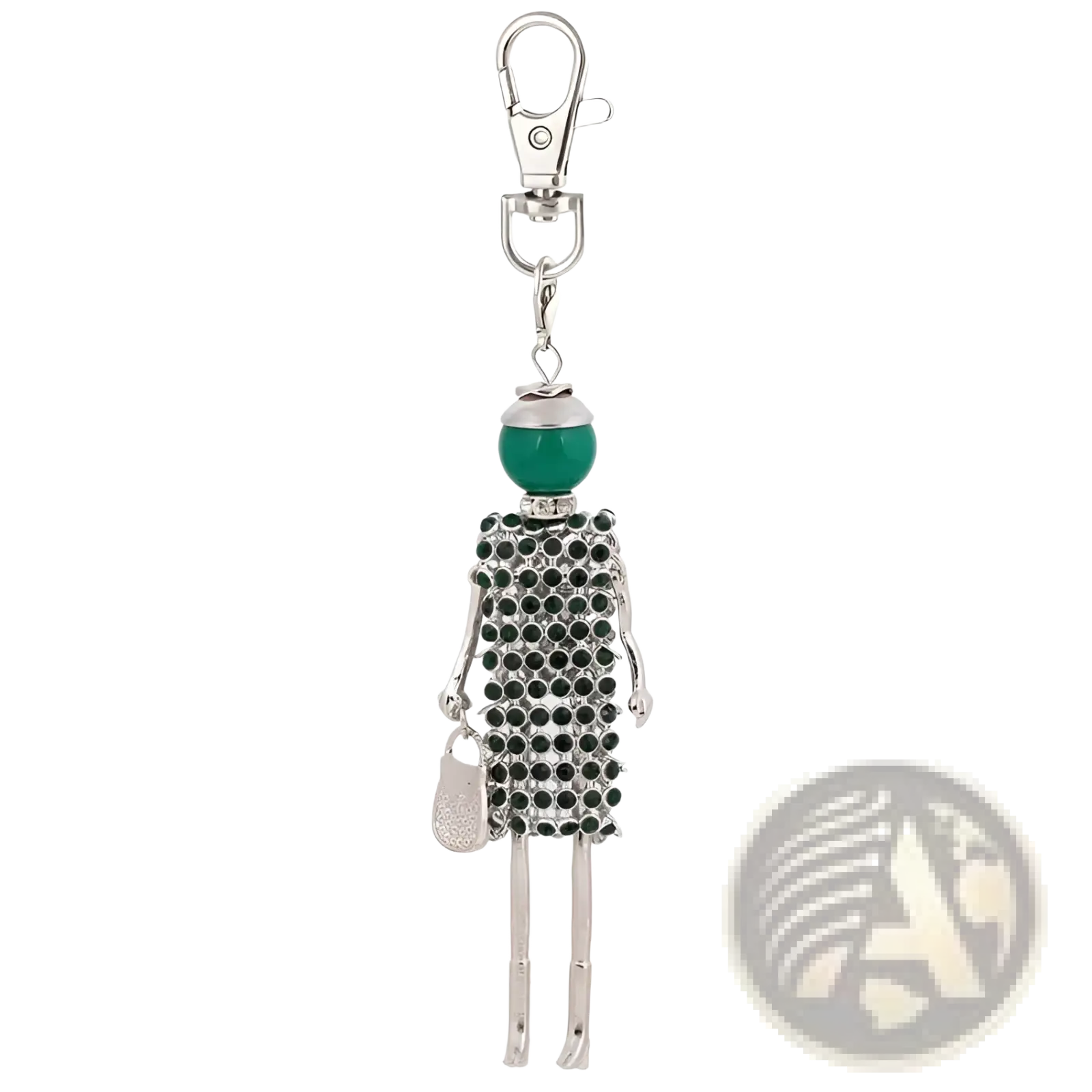 Silver-toned rhinestone doll keychain featuring a stylized female figure with green bead head and black dress holding handbag