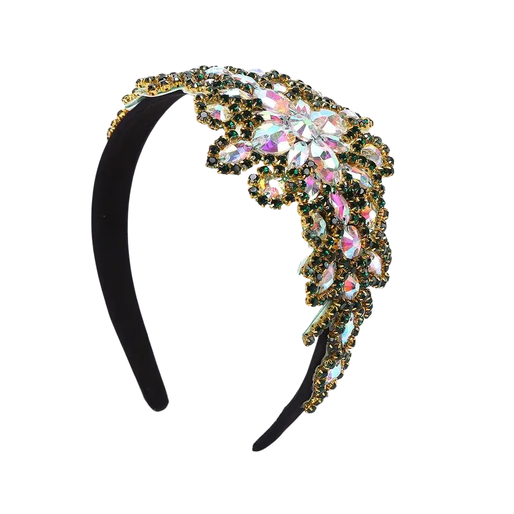 A black velvet rhinestone flower headband with iridescent pink and green crystals set in gold-toned metal