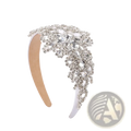 A sparkling silver rhinestone flower headband with a cascading floral design crystal hair accessory