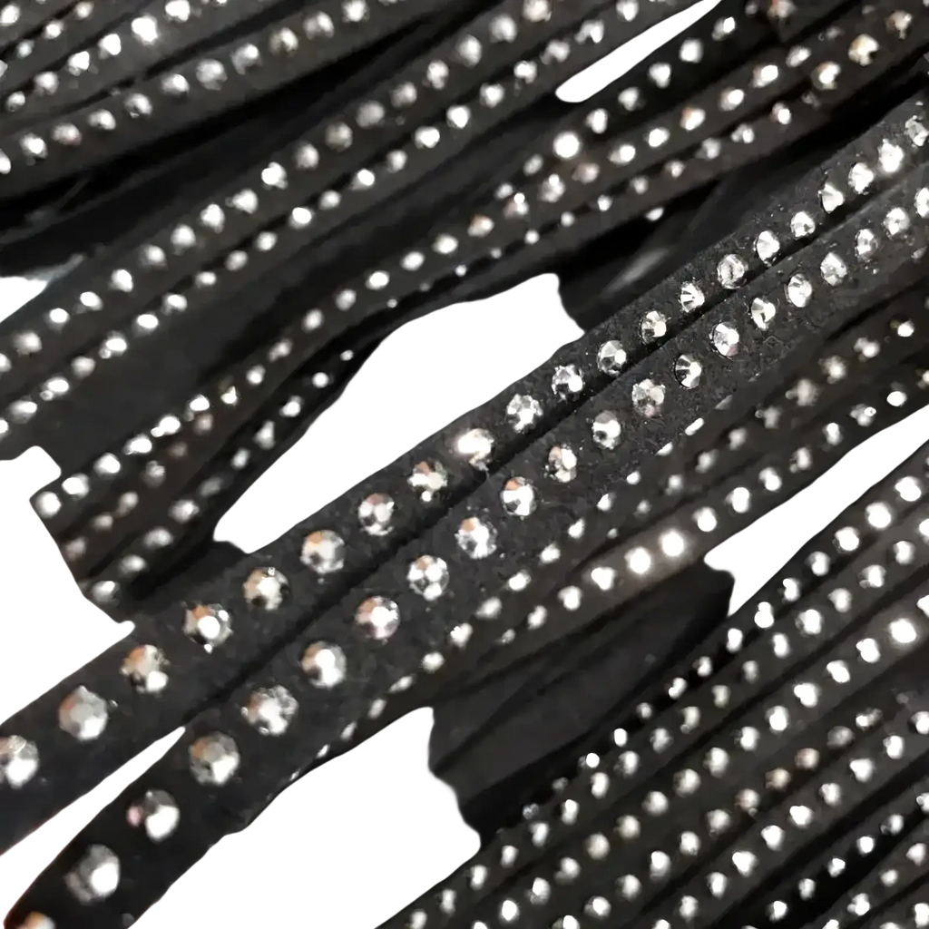 Black rhinestone-embellished leather straps detail on rhinestone fringe high waist mini skirt