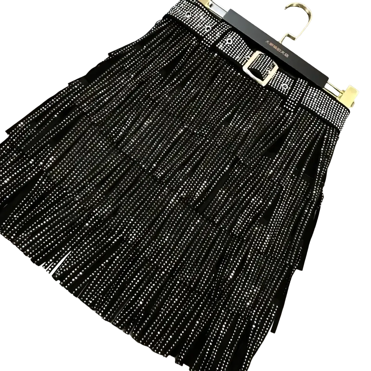 Black fringed rhinestone mini skirt with high waist paired with matching studded belt and gold-tone buckle