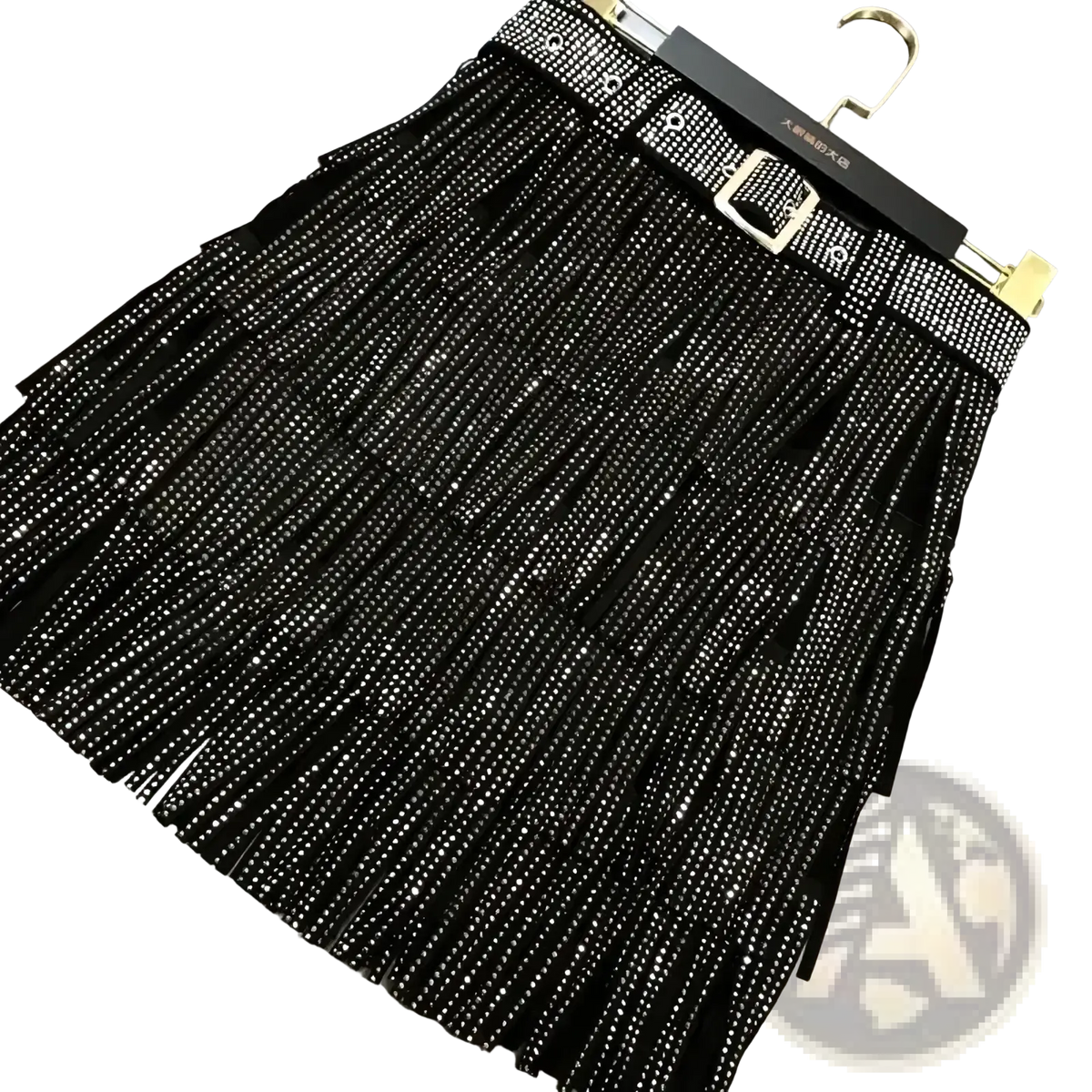 Black fringed rhinestone mini skirt with high waist paired with matching studded belt and gold-tone buckle