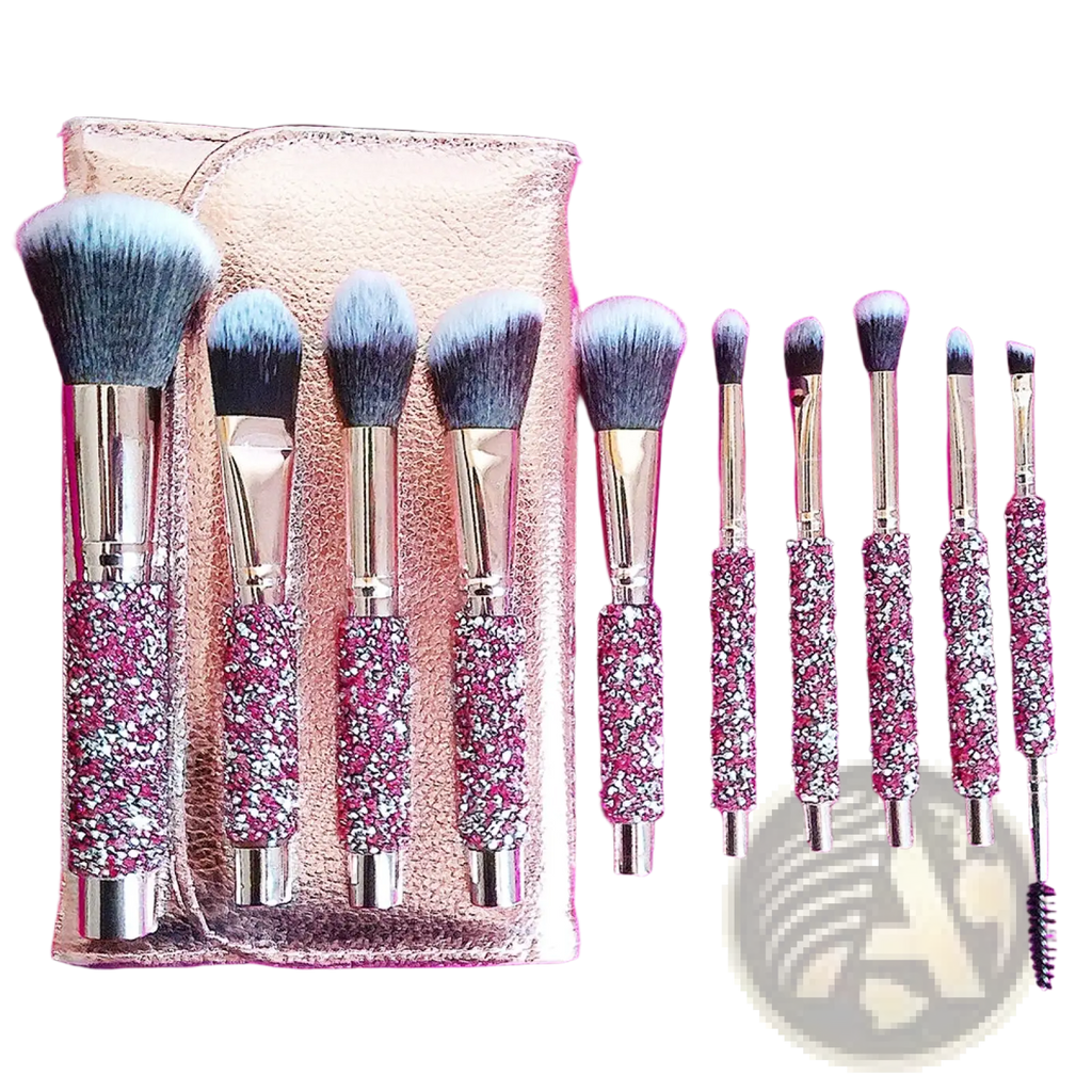 Set of ten rhinestone makeup brushes with pink glittery and silver handles in a rose gold textured case