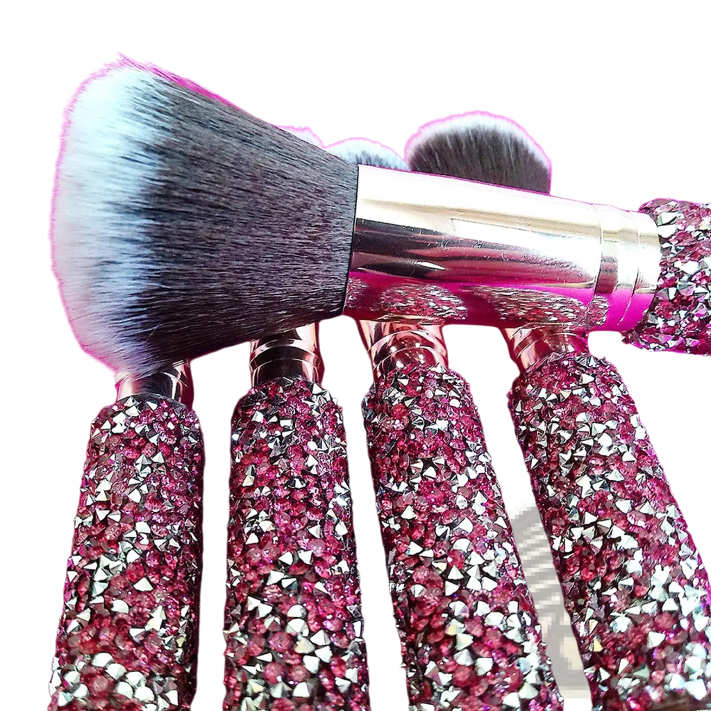 Set of five pink and silver rhinestone-encrusted makeup brushes with metallic handles from a 10 piece rhinestone set