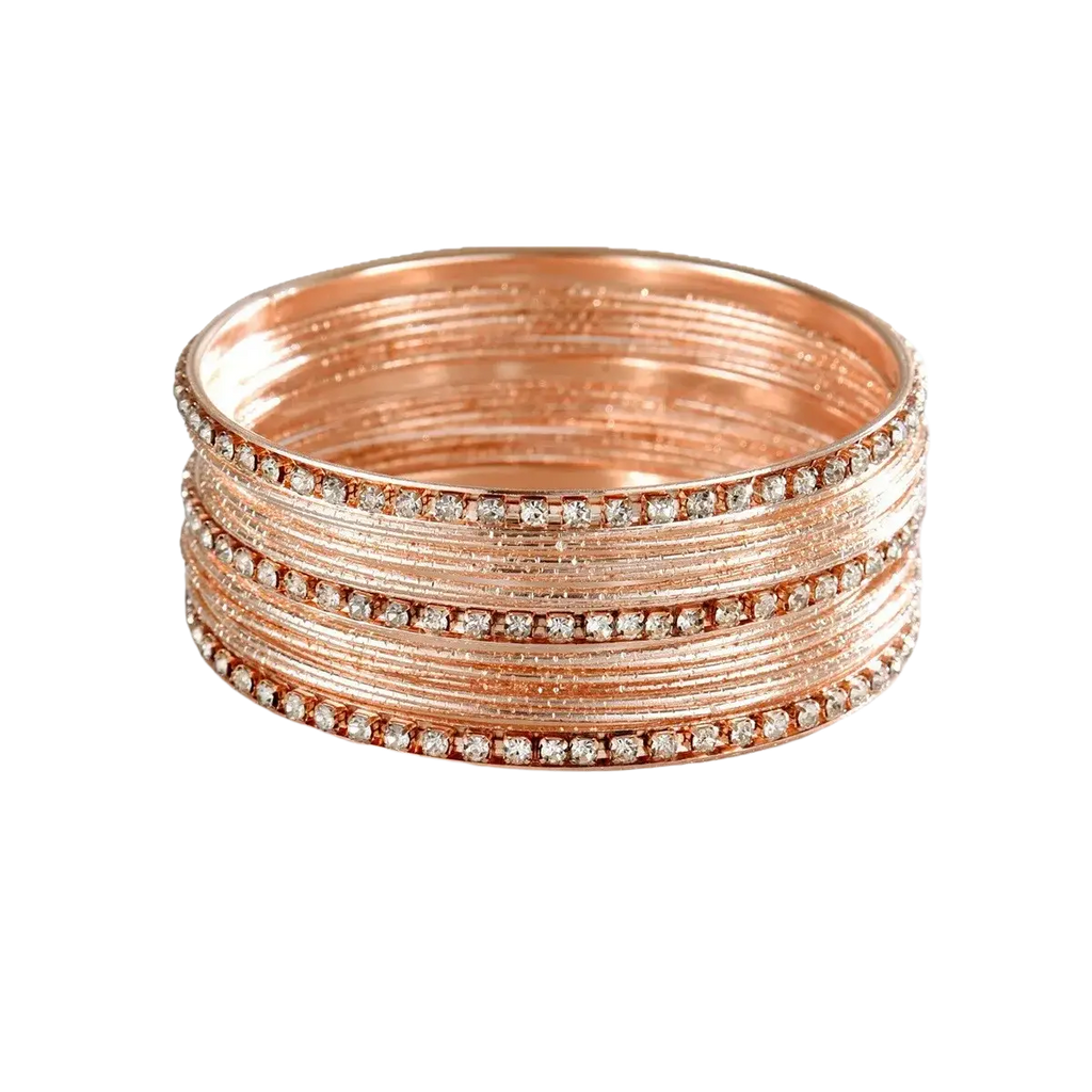A stack of rose gold metal bangles for women adorned with clear rhinestones along the outer edge