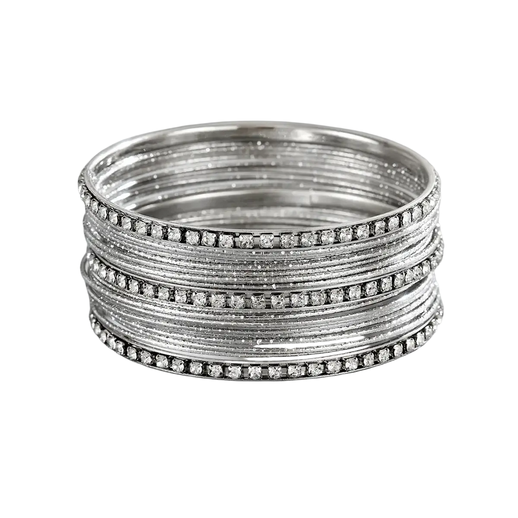 Stack of silver rhinestone metal bangles for women with clear sparkling stones along the outer edge