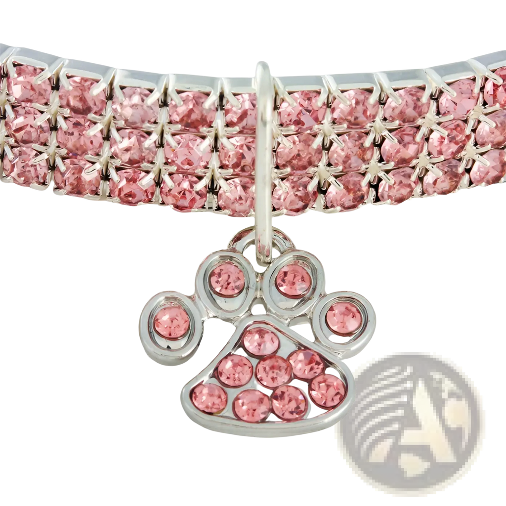 Pink rhinestone paw print pet collar made of sparkling crystals with a matching paw-shaped charm for dogs