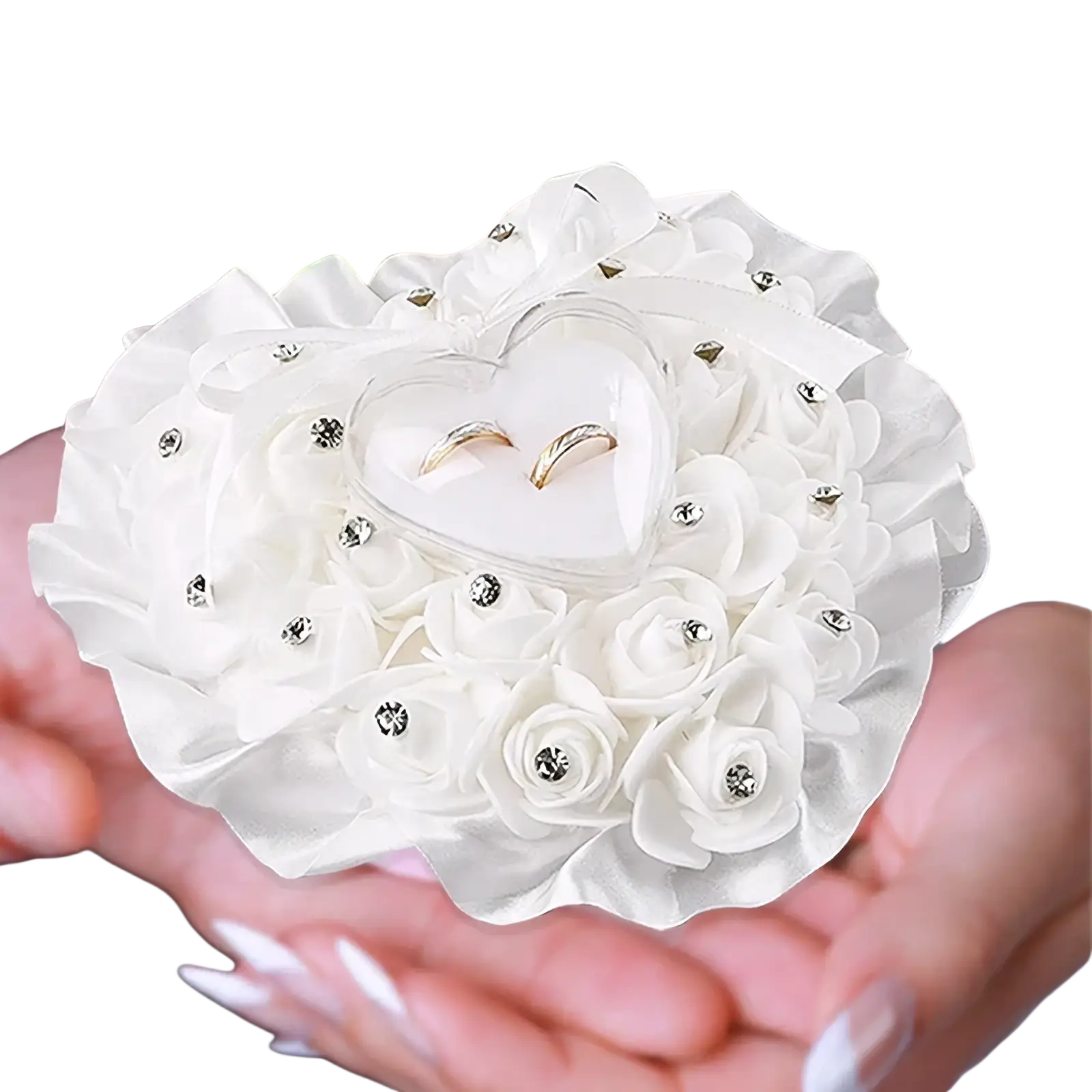 A delicate white rhinestone floral wedding ring pillow with a heart compartment holding two gold rings