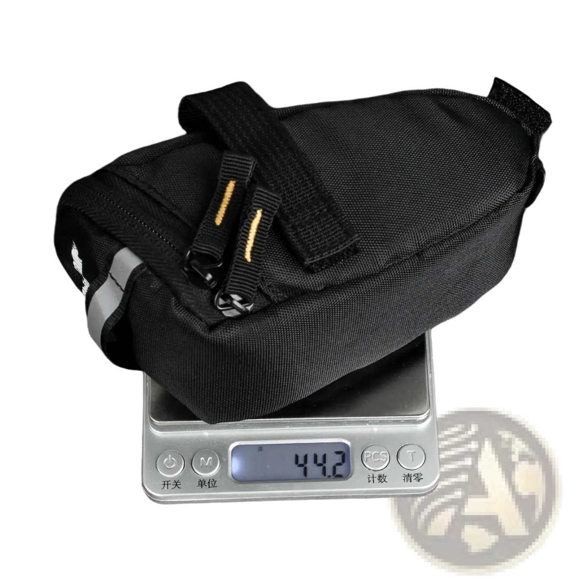 Black rhinowalk waterproof fabric bike saddle bag with reflective gray stripe and yellow-accented straps backside view