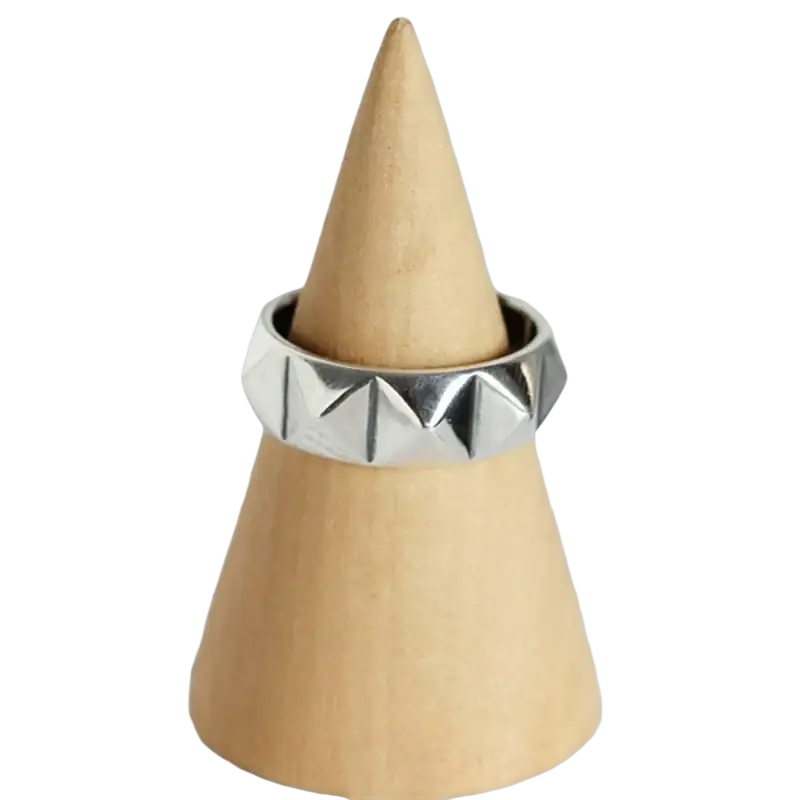 Silver rhombus rings made of zinc alloy featuring a geometric faceted design with sharp triangular patterns
