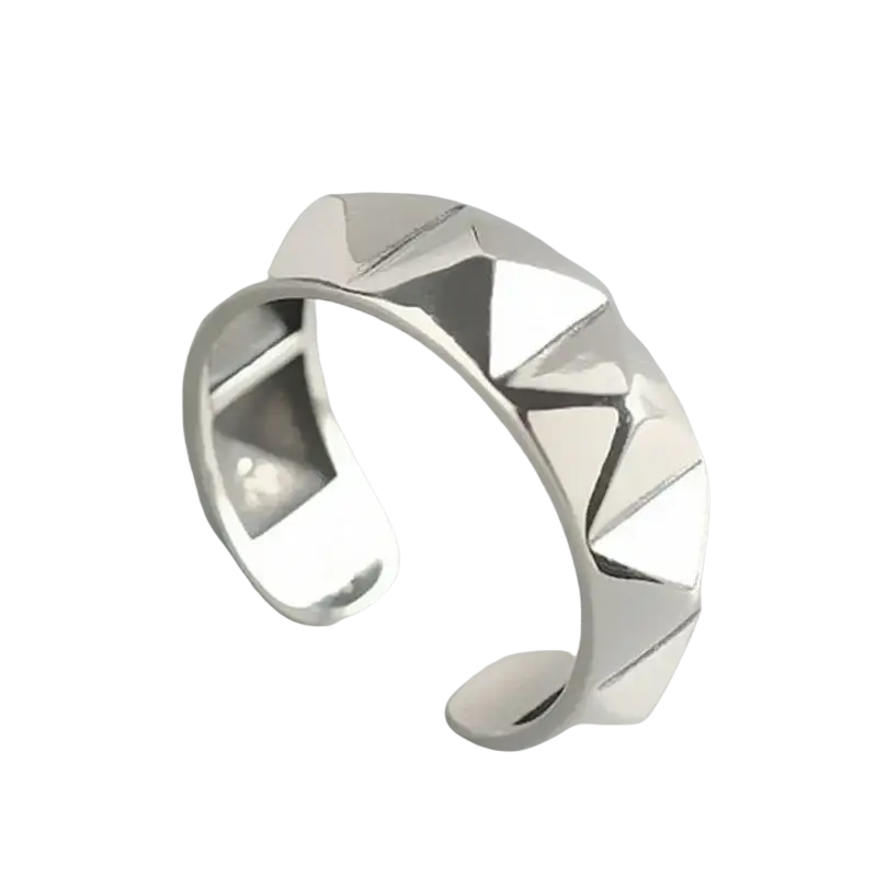 A sleek silver zinc alloy rhombus ring with sharp triangular facets and a modern geometric design