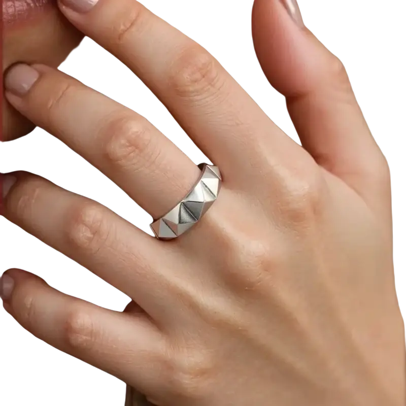 A sleek silver zinc alloy rhombus ring featuring a geometric design with raised triangular facets