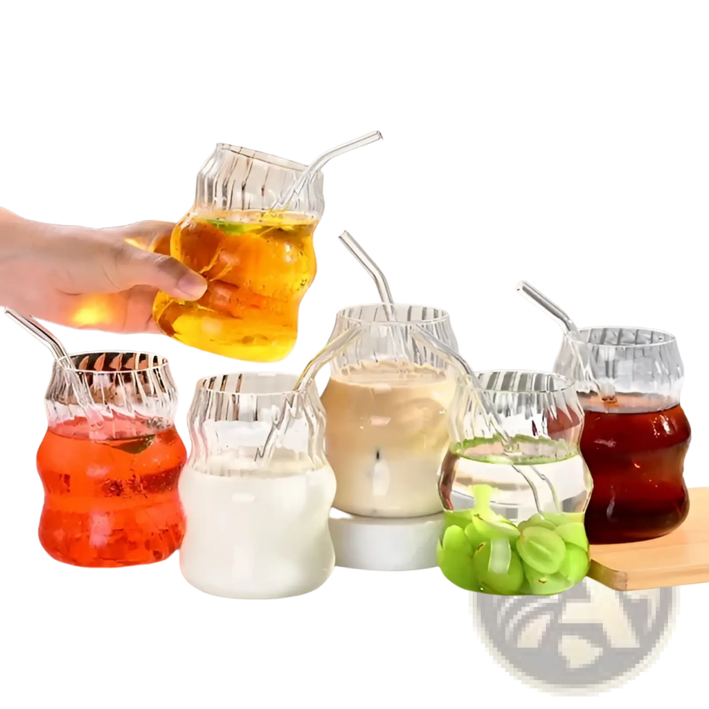 Ribbed glass cups with built-in straws filled with colorful beverages in a 6 piece 19oz clear glass set