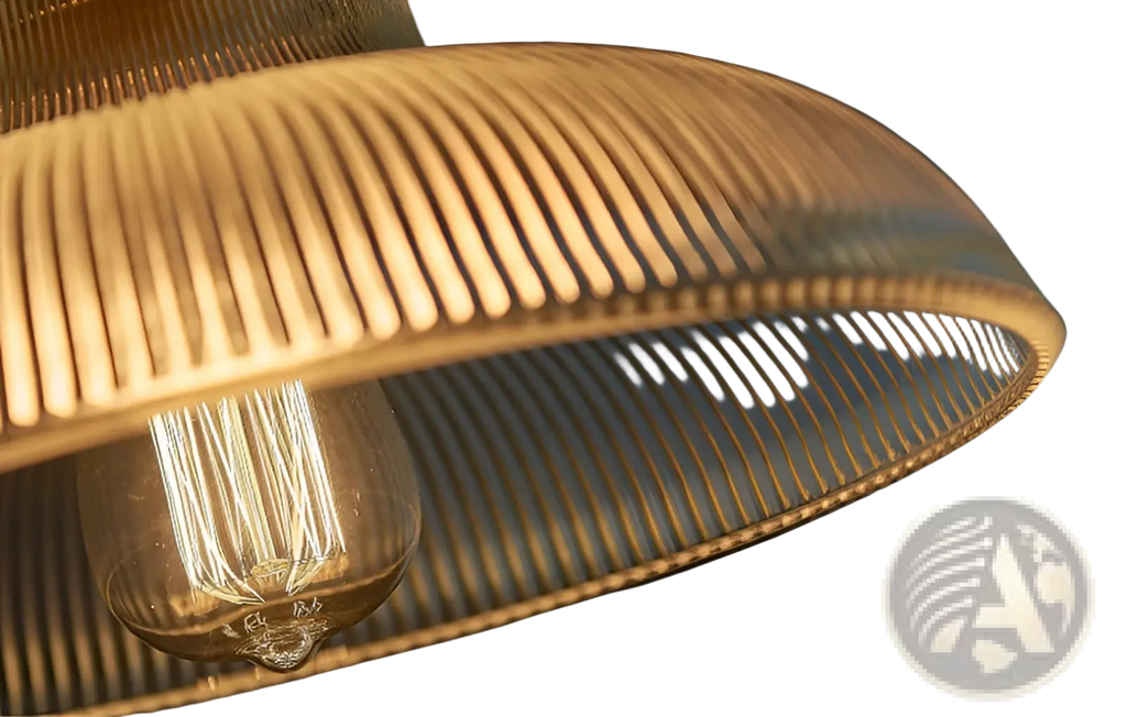 Ribbed glass pendant light with golden ribbed glass lampshade and visible filament bulb inside brass metal fixture